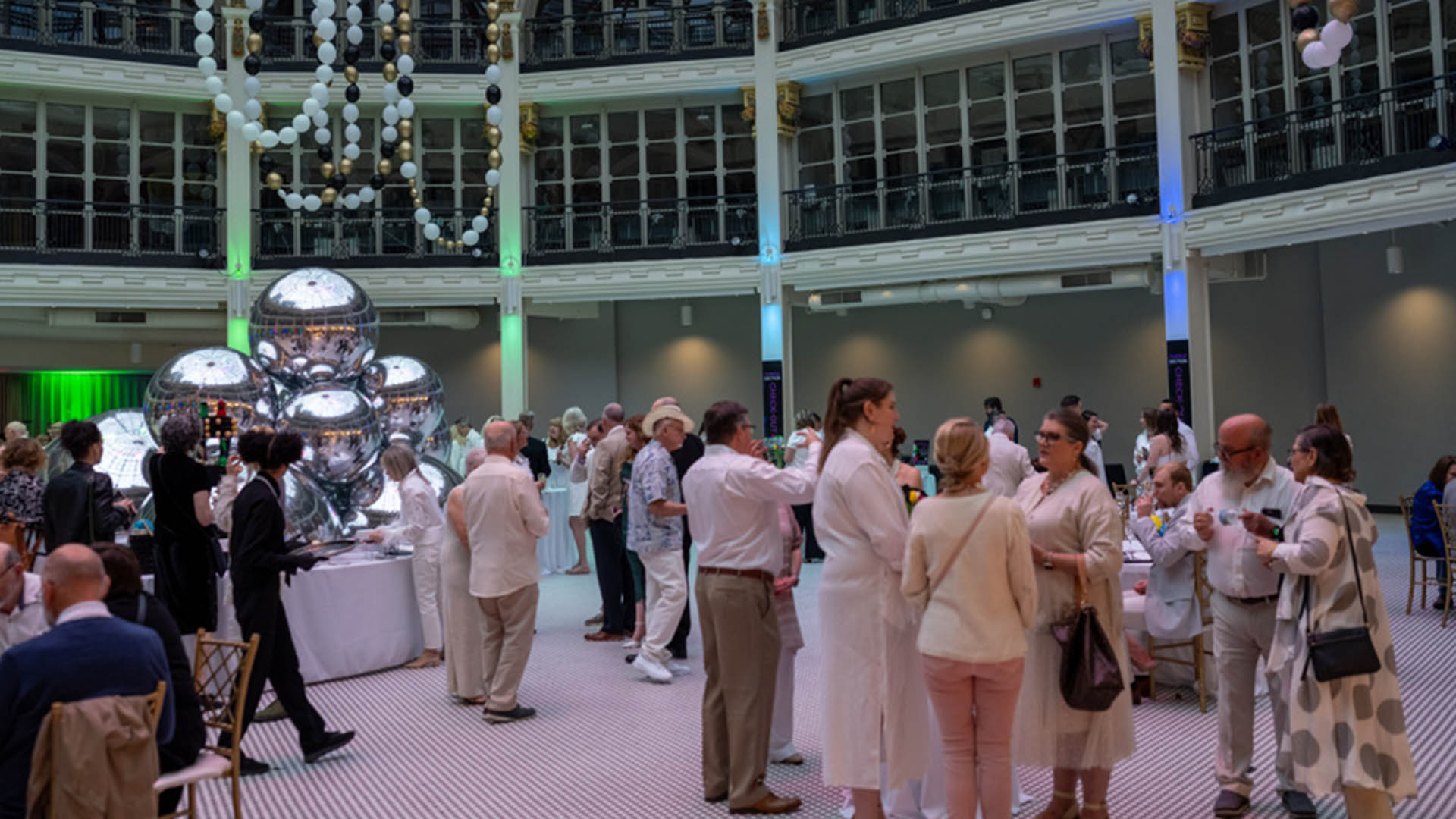 TheCo-crowd members enjoying an event within the Arcade rotunda